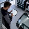 Planificateur approuvant une tournée de vitrage